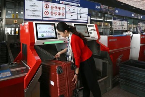 中国国際航空、北京首都国際空港に自動手荷物チェックイン機と自動搭乗機を設置