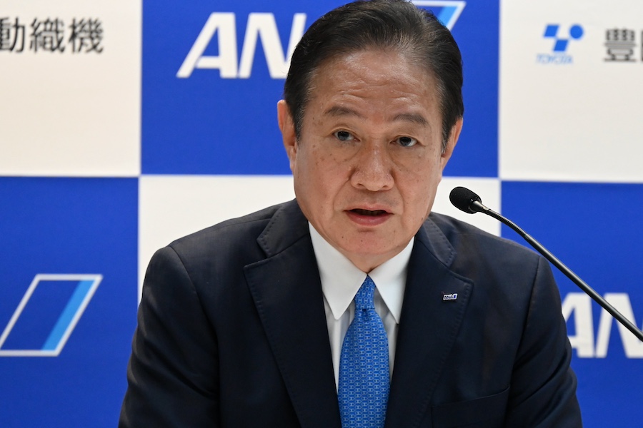 Autonomous towing tractor operating on the apron at Haneda