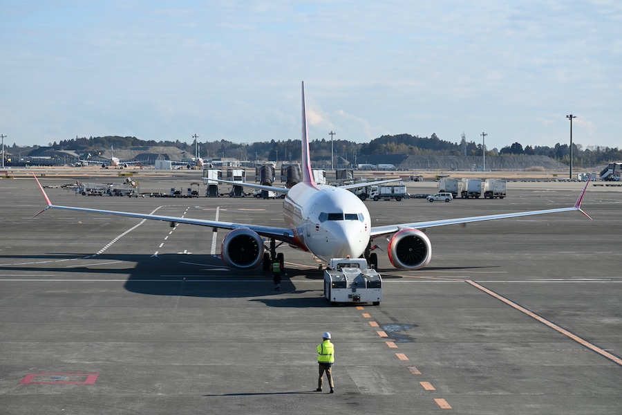 Passengers at Narita inaugural flight gate