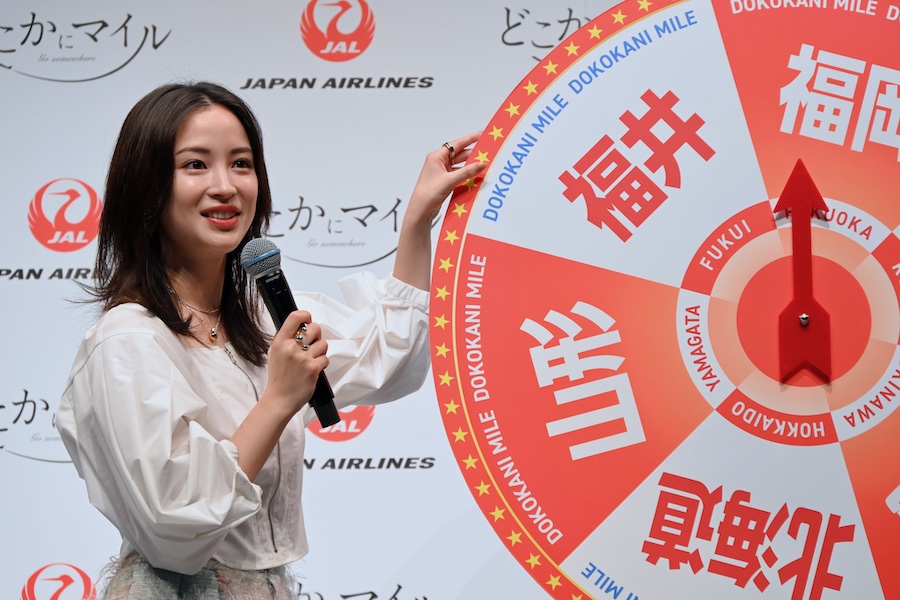 Travel roulette on stage at JAL event