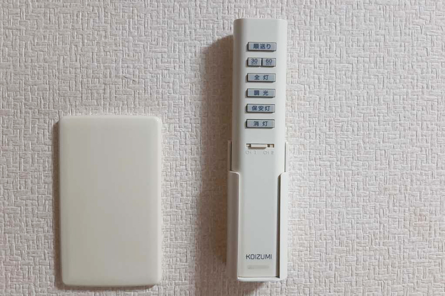In-room facilities: low table, refrigerator, and TV at Hotel Lucky