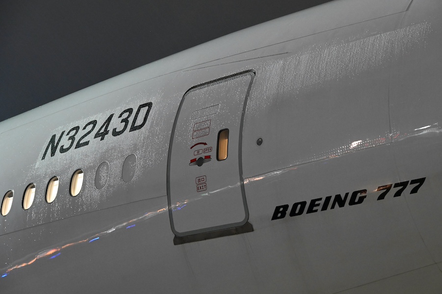 Ground crew working around JA732J