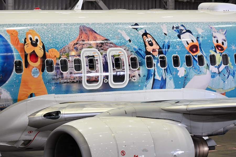 JAL Jubilee Express parked at a gate in Japan