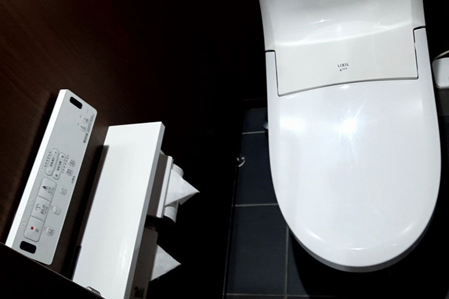 Modern Western-style toilet on the third floor of Hotel Lucky