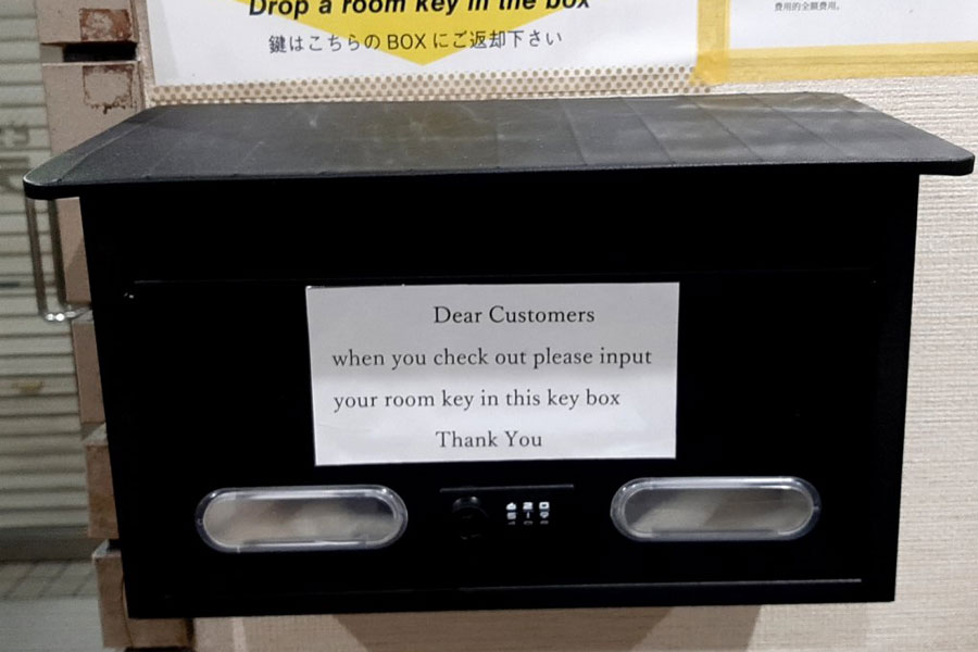 Key return box at Hotel Lucky front desk